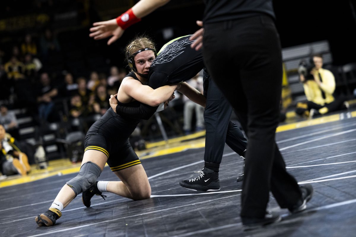 Iowa’s NCAA No. 2 143-pound Reese Larramendy looks up at the official during her match in the Iowa Duals between NCAA-ranked No. 1 Iowa women’s wrestling, NAIA-ranked No. 1 Life University, and Missouri Valley at Carver-Hawkeye Arena in Iowa City on Sunday, Jan. 21, 2024. The Hawkeyes defeated the Big Reds, 42-0, and the Running Eagles, 35-6.