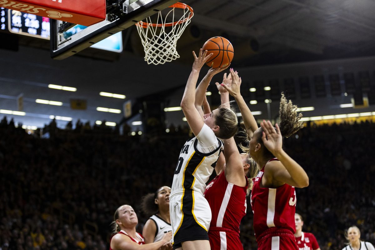 Iowa guard Kate Martin goes up for a shot during a women’s basketball game between No. 5 Iowa and Nebraska in a sold-out Carver-Hawkeye Arena in Iowa City on Saturday, Jan. 27, 2024. The Hawkeyes defeated the Cornhuskers, 92-73.