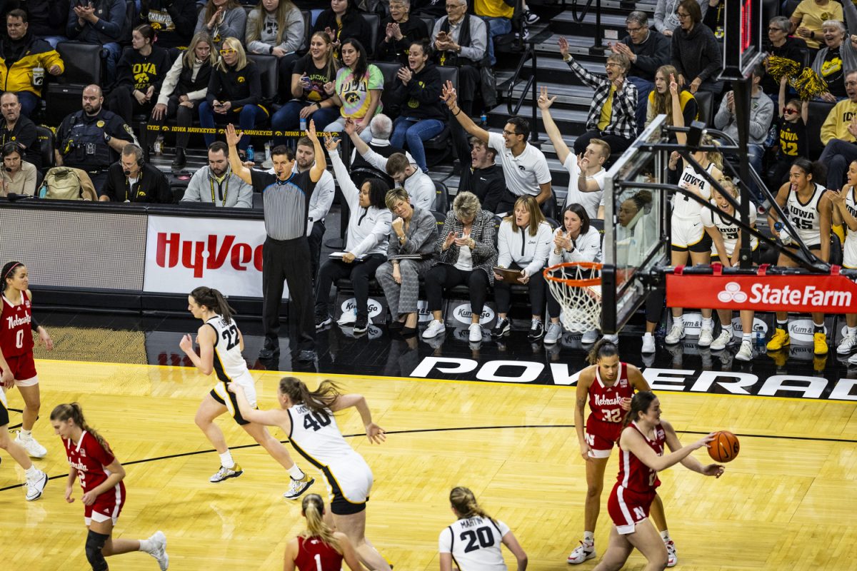Iowa celebrates a 3-pointer during a women’s basketball game between No. 5 Iowa and Nebraska in a sold-out Carver-Hawkeye Arena in Iowa City on Saturday, Jan. 27, 2024. The Hawkeyes defeated the Cornhuskers, 92-73.