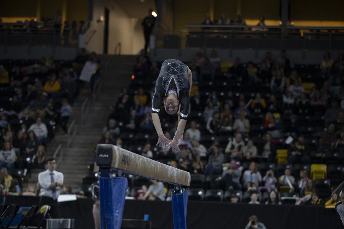 Iowa gymnast Marissa Rojas competes on beam during a gymnastics meet between No. 27. University of Iowa and No. 26 University of Nebraska at Xtream Arena on Sunday, Feb. 4, 2024. The Cornhuskers defeated the Hawkeyes, 196.5- 195.725. Rojas scored a 9.725 in the event.