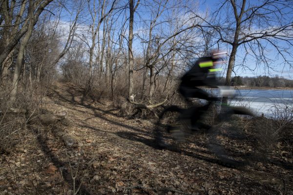 A rider races along Lake Macbride on a single track trail during the seventh annual Lake Macbride Fat Tire Classic in Solon on Saturday, Feb. 10, 2024. 