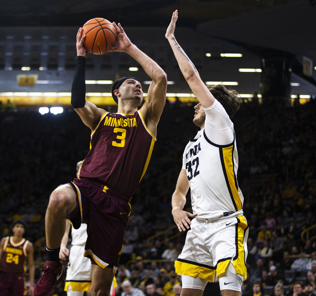 Minnesota+forward+Dawson+Garcia+goes+up+for+a+layup+during+a+men%E2%80%99s+basketball+game+between+Minnesota+and+Iowa+at+Carver-Hawkeye+Arena+on+Sunday%2C+Feb.+11%2C+2024.+The+Hawkeyes+defeated+the+Gophers+90-85.+Garcia+scored+18+points+and+had+seven+rebounds+during+the+game.+%0A%0A