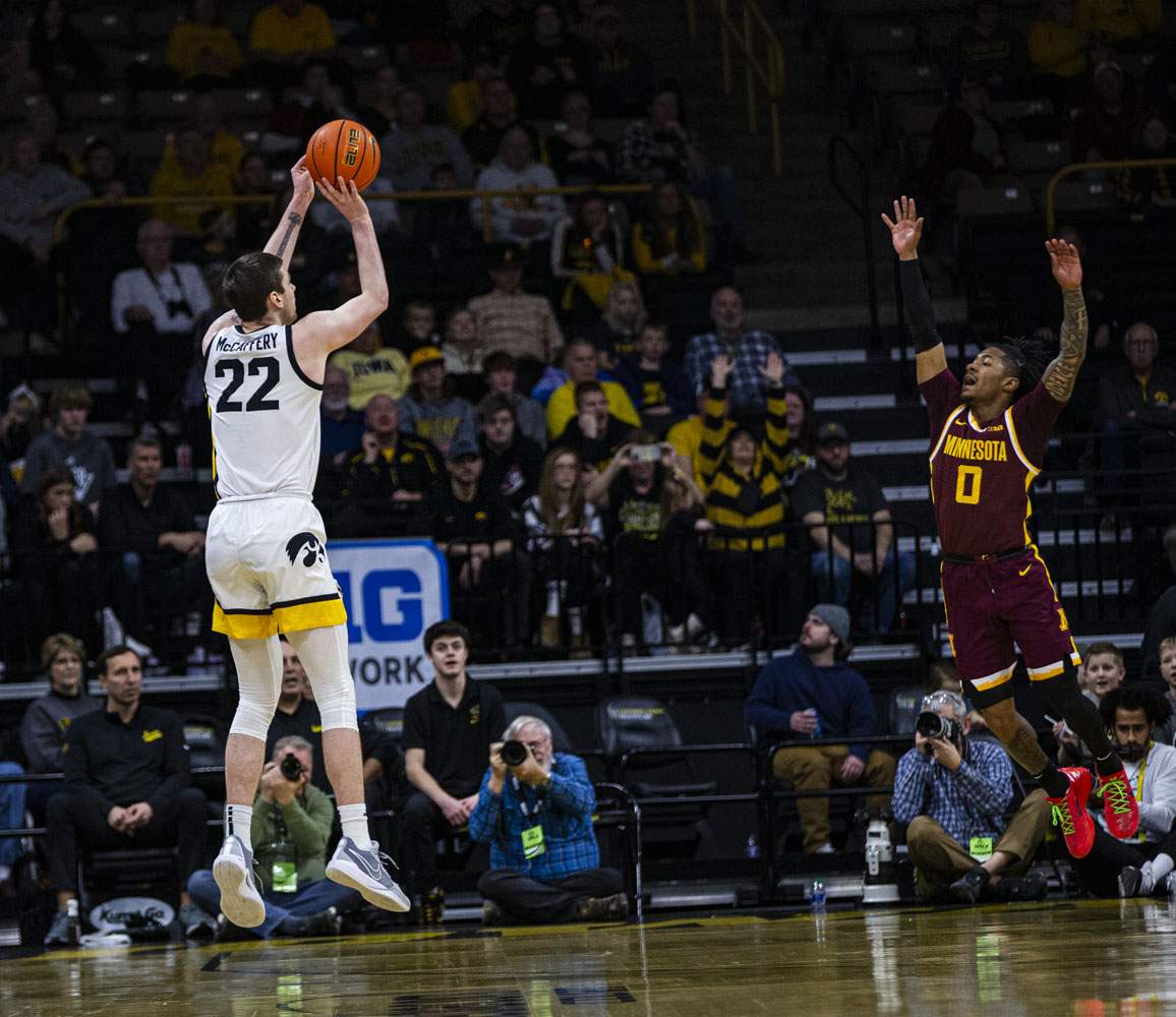 Iowa forward Patrick McCaffery shoots a three pointer during a men’s basketball game between Minnesota and Iowa at Carver-Hawkeye Arena on Sunday, Feb. 11, 2024. The Hawkeyes defeated the Gophers 90-85. McCaffery had 21 points during the game.

