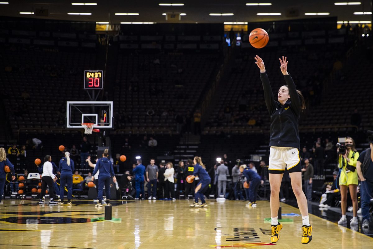 Iowa guard Caitlin Clark warm up before a women’s basketball game between No. 2 Iowa and Michigan at Carver-Hawkeye Arena on Thursday, Feb. 11, 2024.
