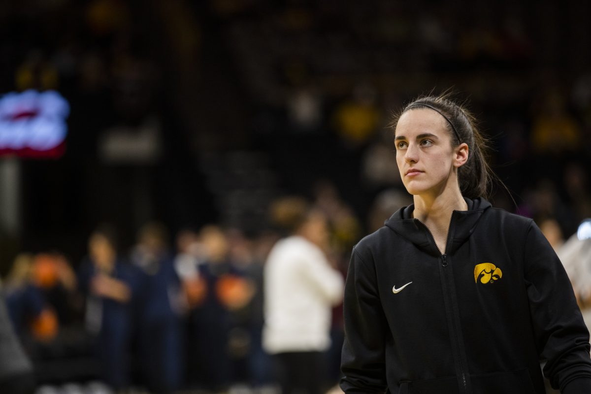Iowa guard Caitlin Clark warms up before a women’s basketball game between No. 2 Iowa and Michigan at Carver-Hawkeye Arena on Thursday, Feb. 11, 2024.
