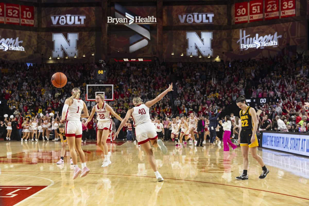 Nebraska forward Natalie Potts celebrates with teammates after a women’s basketball game between No. 2 Iowa and Nebraska at Pinnacle Bank Arena in Lincoln, Neb., on Sunday, Feb. 11, 2024. The Cornhuskers defeated the Hawkeyes, 82-79. 