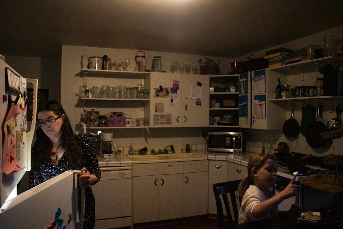 Mandi Remington prepares breakfast with her daughter Arya Nichols on Tuesday, Feb. 13, 2024. 