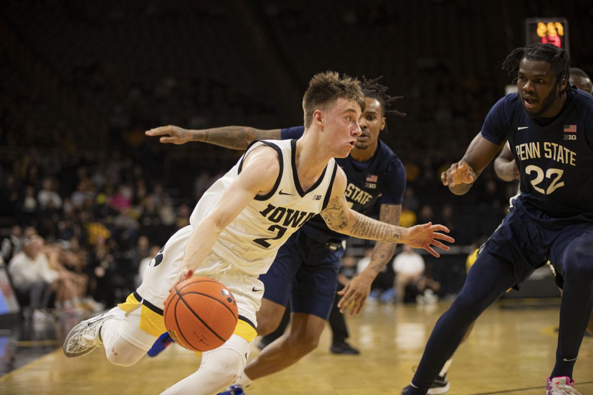 Iowa guard Brock Harding drives to the baseline during a men’s basketball game between Iowa and Penn State at Carver-Hawkeye Arena on Tuesday, Feb. 27, 2024. The Hawkeyes defeated the Nittany Lions, 90-81.