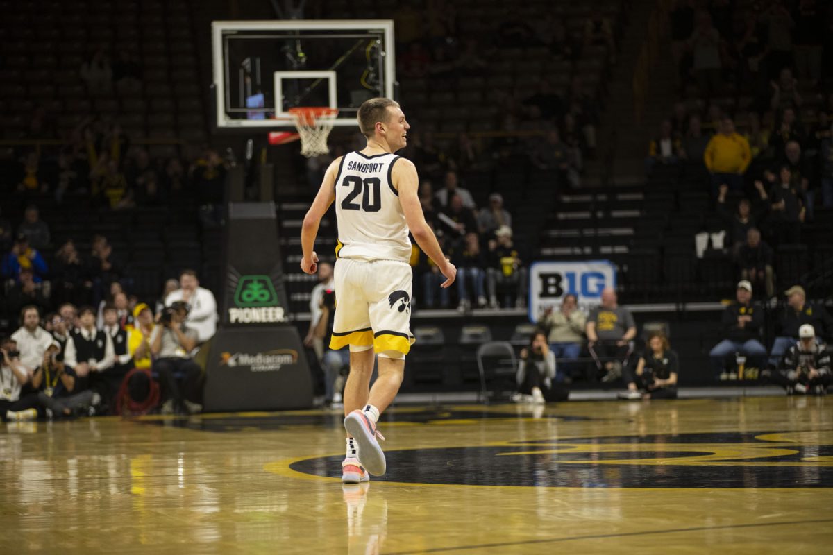 Iowa forward Payton Sandfort celebrates after grabbing the game-sealing rebound during a men’s basketball game between Iowa and Penn State at Carver-Hawkeye Arena on Tuesday, Feb. 27, 2024. The Hawkeyes defeated the Nittany Lions, 90-81.