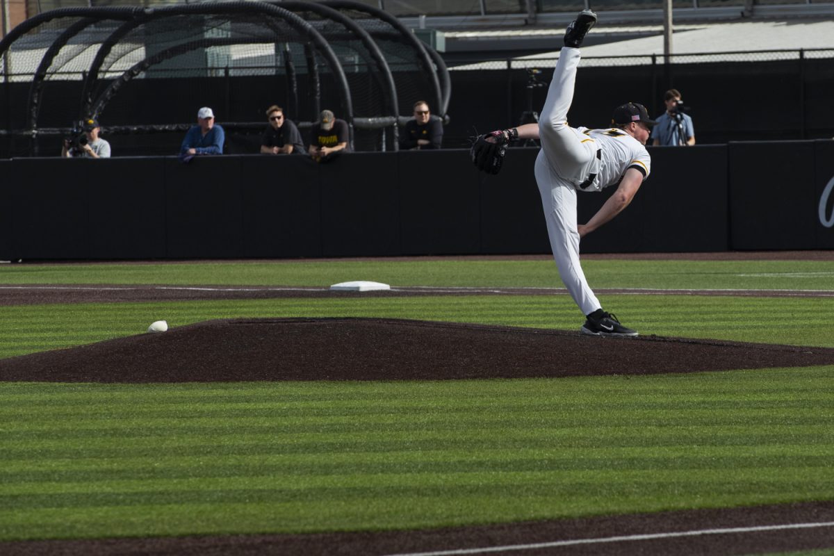 Iowa pitcher Justin Hackett pitches the ball during a baseball game between No. 18 Iowa and Northern Illinois at Duane Banks Field on Tuesday, February. 27, 2024. The Hawkeyes defeated the Huskies 14-6.