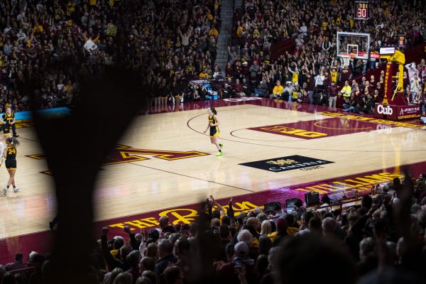 Iowa guard Caitlin Clark backpedaled after scoring a 3-pointer during a basketball game between No. 6 Iowa and Minnesota at Williams Arena in Minneapolis, Minn., on Wednesday, Feb. 28, 2024. The Hawkeyes defeated the Gophers, 108-60. Clark scored 33 points. 