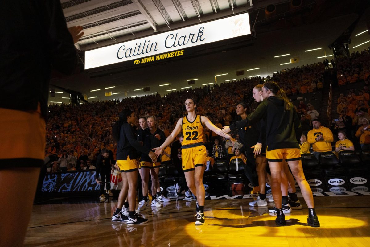 Iowa guard Caitlin Clark walks onto the court during a women’s basketball game between No. 4 Iowa and Michigan State in a sold-out Carver-Hawkeye Arena on Tuesday, Jan. 2, 2023. The Hawkeyes defeated the Spartans, 76-73.