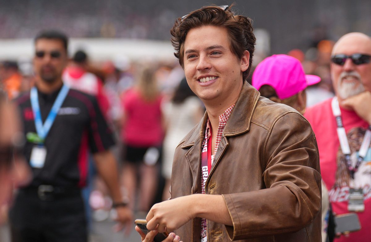 Cole Sprouse greets people Sunday, May 28, 2023, before the 107th running of the Indianapolis 500 at Indianapolis Motor Speedway.