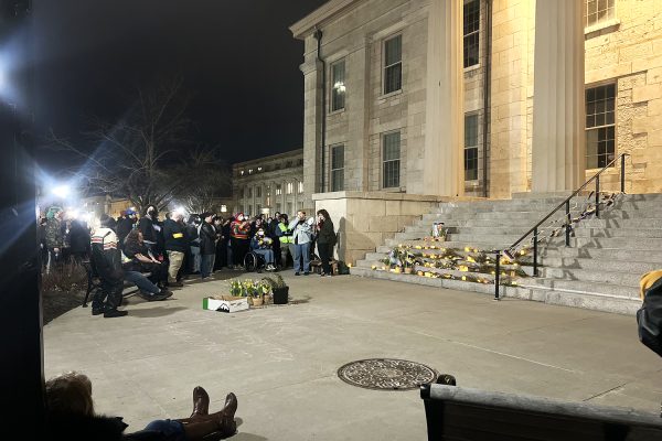 Iowa City community members hold a vigil for Nex Benedict on the Pentacrest in Iowa City on Friday, Feb. 23, 2024. Benedict, a 16-year-old nonbinary teen from Owasso, Oklahoma, died after an altercation with other students at school. The official cause of their death has not yet been determined.