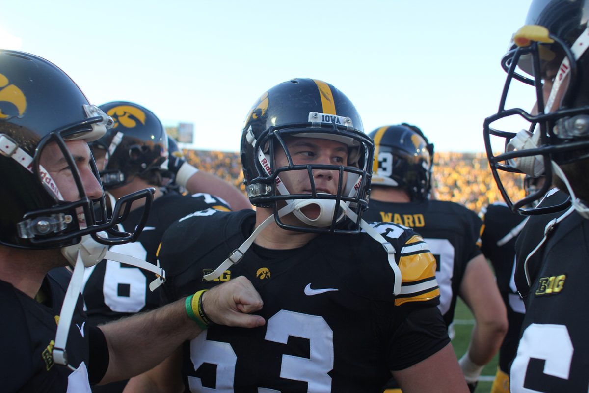Iowa offensive linebacker James Ferentz celebrates with his teammates after the game against UNI at Kinnick stadium in Iowa City, Iowa on Saturday, September 15, 2012. The Hawkeyes defeated the Panthers, 27-16. (The Daily Iowan/Adam Wesley)