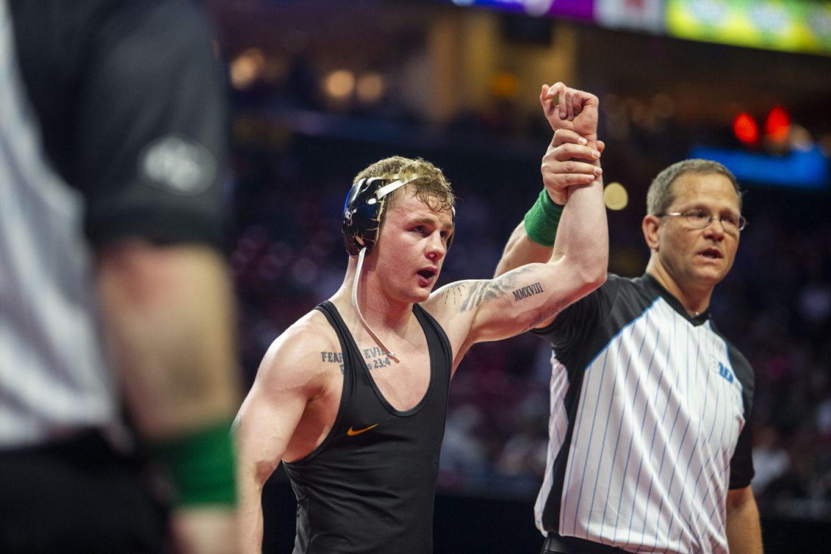 A+referee+holds+up+Iowas+No.+14+133-pound+Brody+Teske%E2%80%99s+hand+after+a+match+with+No.+11+Purdue%E2%80%99s+Dustin+Norris+during+session+one+of+the+Big+Ten+Wrestling+Championships+at+the+Xfinity+Center+in+College+Park%2C+MD%2C+on+Saturday%2C+March+9%2C+2024.