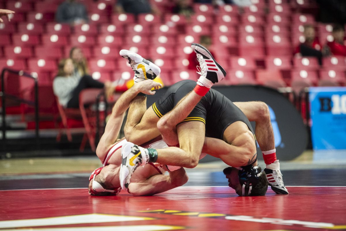 No. 3 141-pound Iowa’s Real Woods wrestles No. 4 141-pound Nebraska’s Brock Hardy  during session three of the Big Ten Wrestling Championships at the Xfinity Center in College Park, MD, on Saturday, March 9, 2024. 