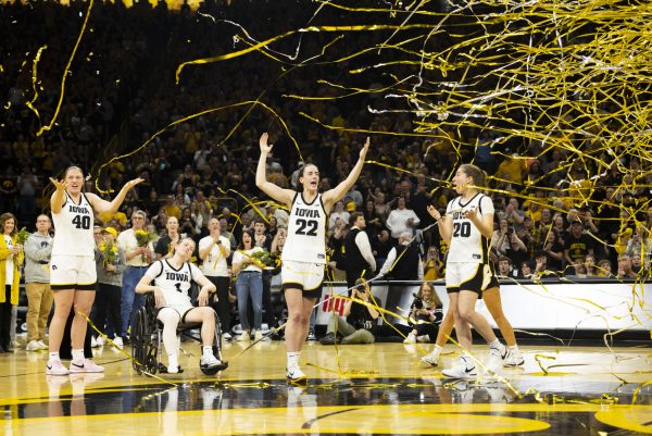 Iowa guard Caitlin Clark celebrates after the senior recognition during a basketball game with No. 6 Iowa and No. 2 Ohio State inside a sold-out Carver-Hawkeye Arena in Iowa City, Iowa, on Sunday, March 3, 2024. The Hawkeyes upset the Buckeyes, 93-83, on senior night.