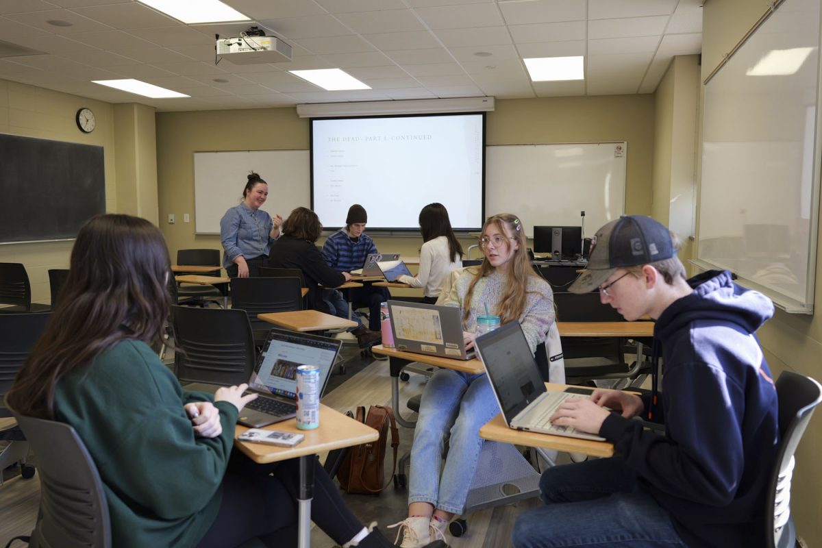 Students work in groups during the translation course World Literature: 1700 at Van Allen Hall in Iowa City on Wednesday, March 6, 2024. One year ago, the University of Iowa was the first University in the U.S. to create a B.A. degree in Translation.