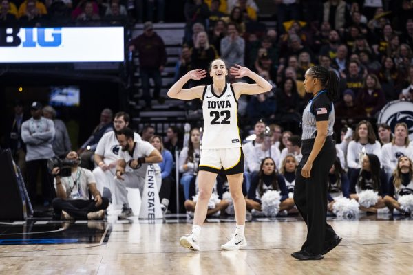 Iowa guard Caitlin Clark hypes up the crowd during a basketball game between No. 2 lowa and No. 7 Penn State at the TIAA Big Ten Womens Basketball Tournament at Target Center in Minneapolis, Minn., on Friday, March 8, 2024. The Hawkeyes defeated the Nittany Lions, 95-62.