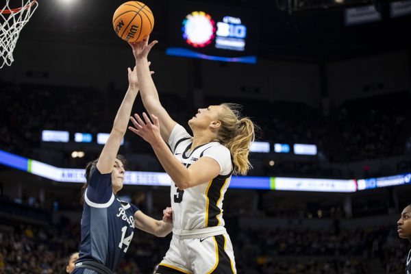 Iowa guard Sydney Affolter goes in for a layup during a basketball game between No. 2 Iowa and No. 7 Penn State at the TIAA Big Ten Women’s Basketball Tournament at Target Center in Minneapolis, Minn., on Friday, March 8, 2024. The Hawkeyes defeated the Nittany Lions, 95-62.