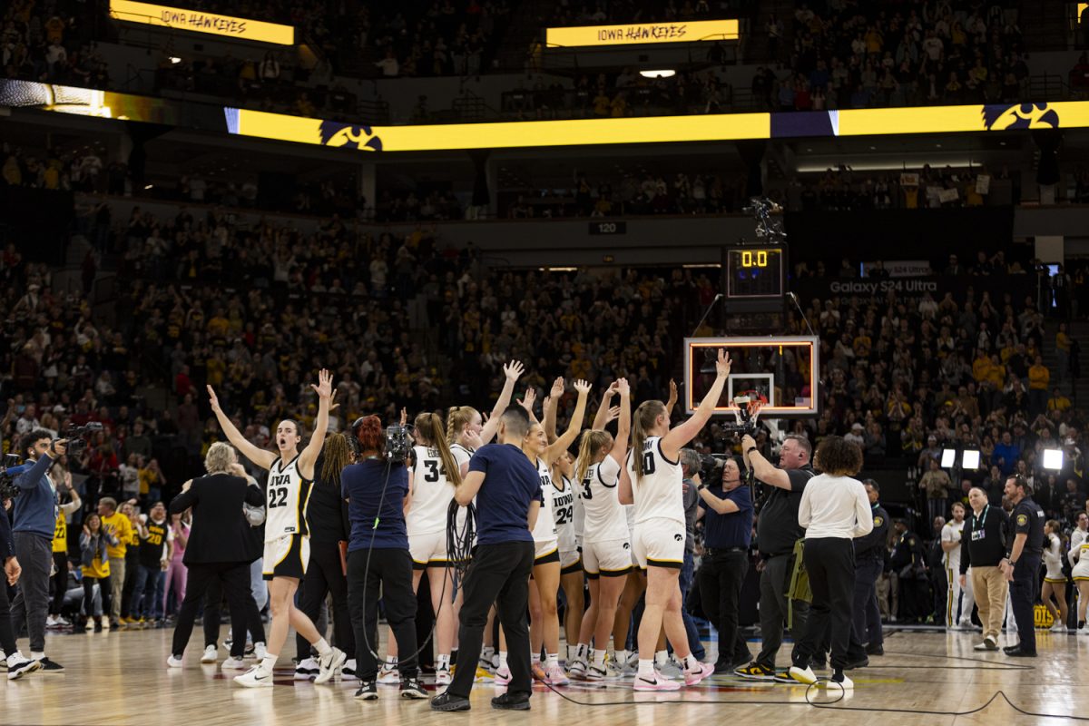 The Iowa women’s basketball team waves to fans after a basketball game between No. 2 Iowa and No. 7 Penn State at the TIAA Big Ten Women’s Basketball Tournament at Target Center in Minneapolis, Minn., on Friday, March 8, 2024. The Hawkeyes defeated the Nittany Lions, 95-62.