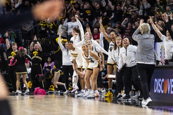Iowa celebrates during a basketball game between No. 2 Iowa and No. 6 Michigan at the TIAA Big Ten Women’s Basketball Tournament at Target Center in Minneapolis, Minn., on Saturday, March 9, 2024.