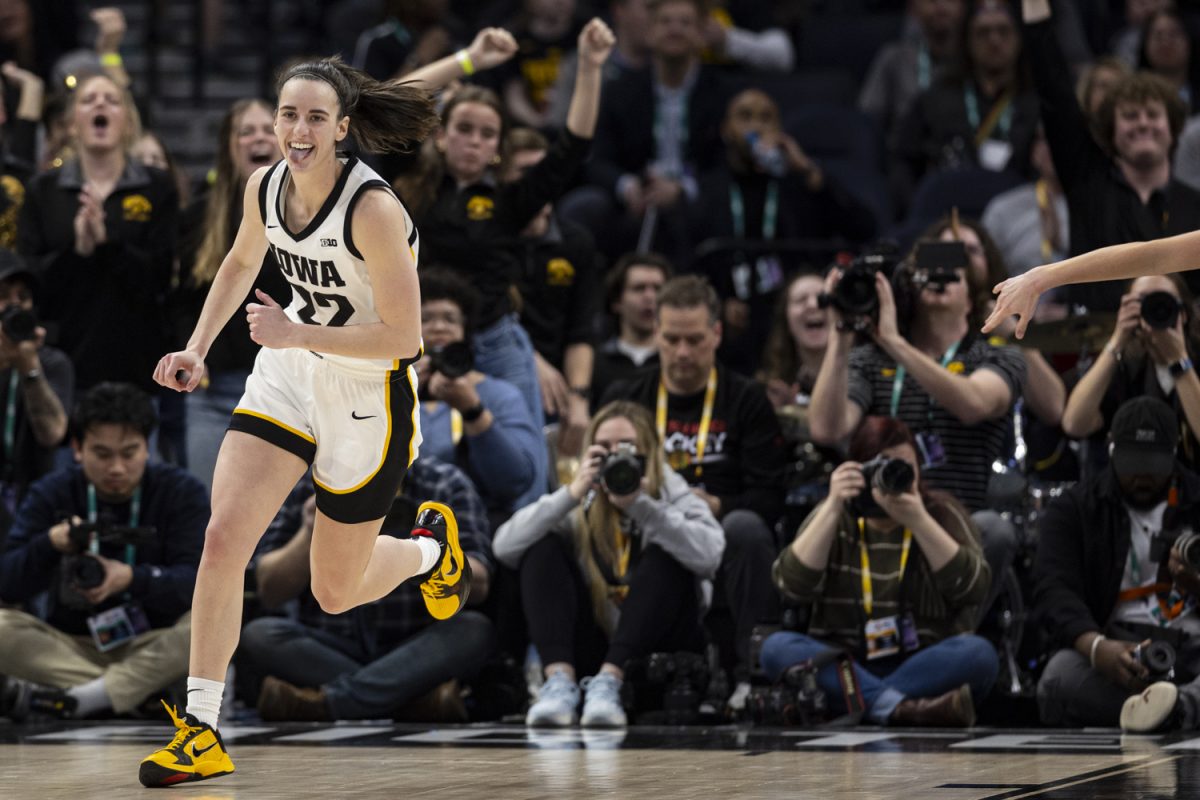 Iowa guard Caitlin Clark celebrates during a basketball game between No. 2 Iowa and No. 6 Michigan at the TIAA Big Ten Women’s Basketball Tournament at Target Center in Minneapolis, Minn., on Saturday, March 9, 2024. The Hawkeyes defeated the Wolverines, 95-68.