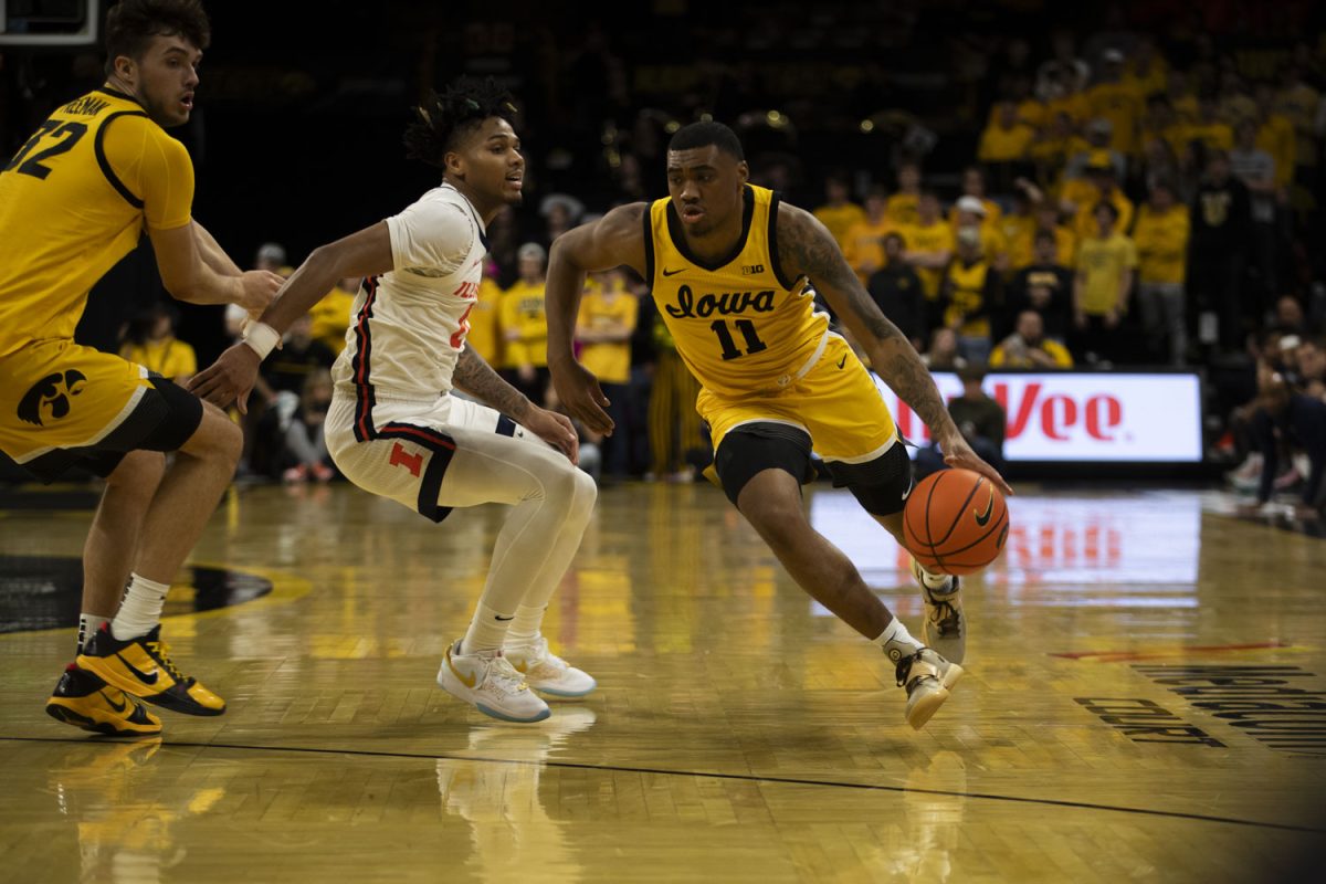 Iowa guard Tony Perkins drives to the lane during a men’s basketball game between Iowa and Illinois in Carver-Hawkeye Arena on Sunday, March 10, 2024. Illinois beat Iowa 73-61.