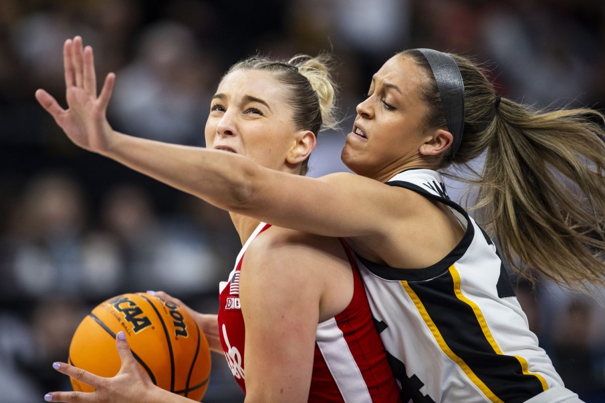 Iowa guard Gabbie Marshall guards Nebraska guard Jaz Shelley during a basketball game between No. 2 Iowa and No. 5 Nebraska at the TIAA Big Ten Women’s Basketball Tournament at Target Center in Minneapolis, Minn., on Sunday, March 10, 2024. The Hawkeyes defeated the Corn Huskers in overtime, 94-89.