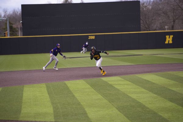 Iowa Infielder Raider Tello runs past the third base during the second baseball game between Iowa and Western Illinois at Duane Banks Filed on Saturday, March 16, 2024. The Hawkeyes would win 19-9 in the eighth inning. Tello has an average of .313 this season. 