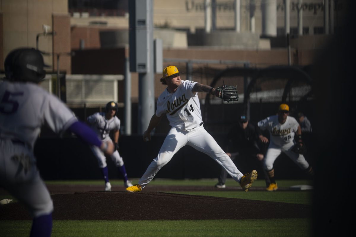 Iowa+pitcher%2C+Brody+Brecht+winds+up+a+pitch+as+Western+Illinois+baserunners+lead+off+during+a+baseball+game+between+Iowa+and+Western+Illinois+at+Duane+Banks+Field+on+Friday%2C+March+15%2C+2024.+The+Hawkeyes+would+win+11-1+in+the+eighth+inning.