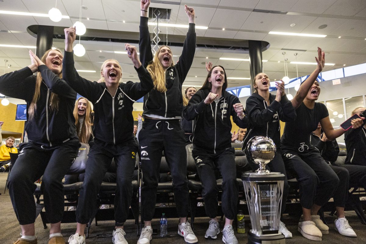 The Iowa women’s basketball team react during a Selection Show watch party with the Iowa women’s basketball team in the Feller Club Room at Carver-Hawkeye Arena in Iowa City, Iowa, on Sunday, March 17, 2024. The team watched the reveal of the NCAA Tournament bracket and answered questions from media members afterward. The No. 1-seeded Hawkeyes are set to play the winner of No. 16 Holy Cross and No. 16 UT Martin in the first round at Carver-Hawkeye Arena. 