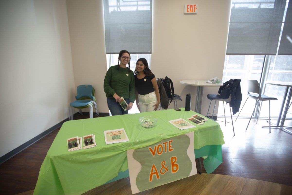 Addison Eckard and Brenda Ramirez tabling for the USG President and Vice President Campaign at Catlett Residence Hall on March, 31, 2024.