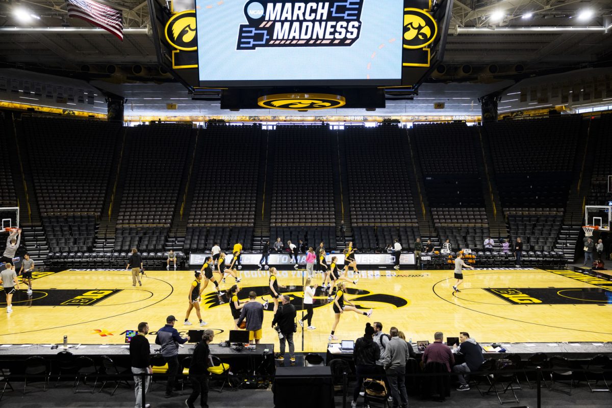 Iowa warms up during a day of press conferences and open practices ahead of an NCAA Tournament First Round game between No. 1 Iowa and No. 16 Holy Cross at Carver-Hawkeye Arena in Iowa City, Iowa, on Friday, March 22, 2024. The Hawkeyes and the Crusaders face off Saturday at 2:00 p.m. CT.