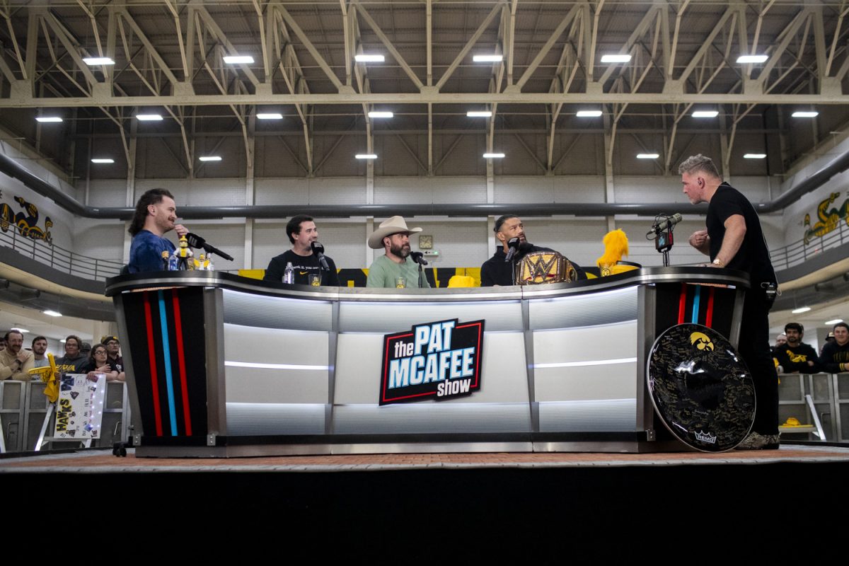 WWE professional wrestler Roman Reigns makes an appearance during The Pat McAfee Show live from the Field House at the University of Iowa on Friday, March 22, 2024. 