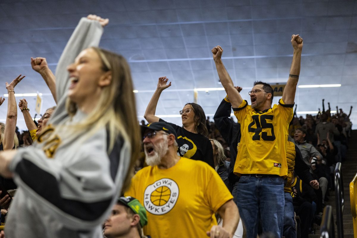 Fans+cheer+during+an+NCAA+Tournament+First+Round+game+between+No.+1+Iowa+and+No.+16+Holy+Cross+at+Carver-Hawkeye+Arena+in+Iowa+City+on+Saturday%2C+March+23%2C+2024.+The+Hawkeyes+defeated+the+Crusaders%2C+91-65.