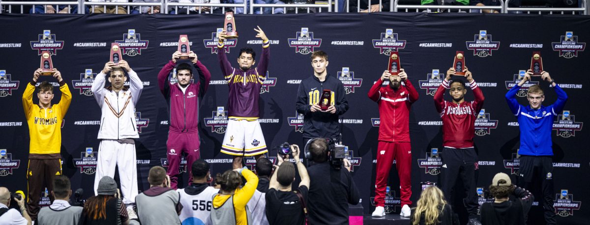 All-Americans of the 125-pound weight class hold their trophies during the final session of the NCAA men’s wrestling championships at T-Mobile Center in Kansas City, Missouri, on Saturday, March 23, 2024.