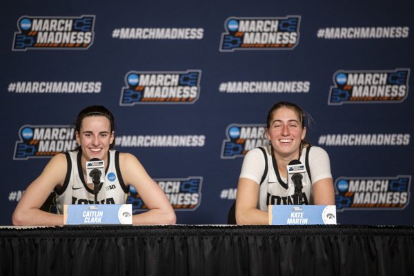 Iowa guard Caitlin Clark and Iowa guard Kate Martin answer questions from the media after an NCAA Tournament First Round game between No. 1 Iowa and No. 16 Holy Cross at Carver-Hawkeye Arena in Iowa City on Saturday, March 23, 2024. The Hawkeyes defeated the Crusaders, 91-65.