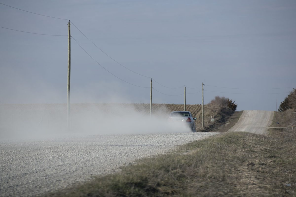 Dust+is+seen+being+kicked+up+from+from+a+car+driving+down+a+gravel+road+outside+os+Solon%2C+Iowa+on+Thursday%2C+March+21%2C+2024.
