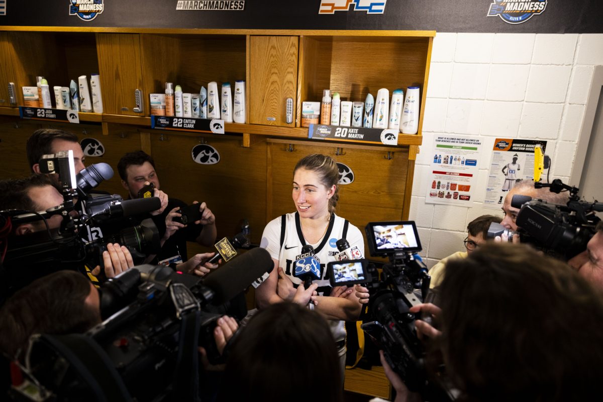Iowa guard Kate Martin answers a question after an NCAA Tournament Sweet Sixteen game between No. 1 Iowa and No. 5 Colorado at MVP Arena in Albany, N.Y., on Saturday, March 30, 2024.