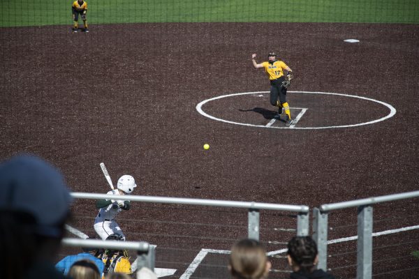 Iowa pitcher Jalen Adams sends a ball toward home plate during the second of two softball games between Iowa and Michigan State at Bob Pearl Field on Saturday, March 30, 2024. The Hawkeyes defeated the Spartans 1-0.