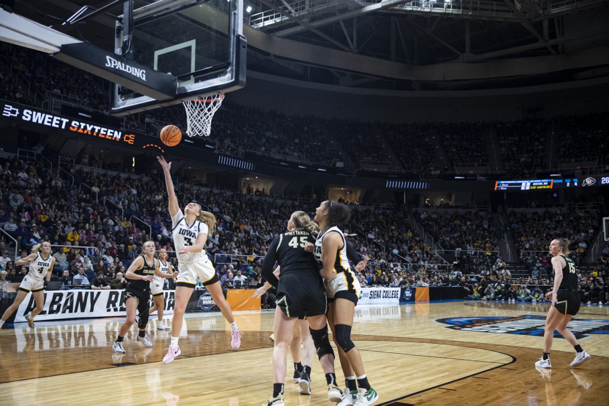 Iowa guard Sydney Affolter goes in for a layup during a NCAA Tournament Sweet Sixteen game between No. 1 Iowa and No. 5 Colorado at MVP Arena in Albany, N.Y., on Saturday, March 30, 2024. The Hawkeyes defeated the Buffaloes, 89-68. 
