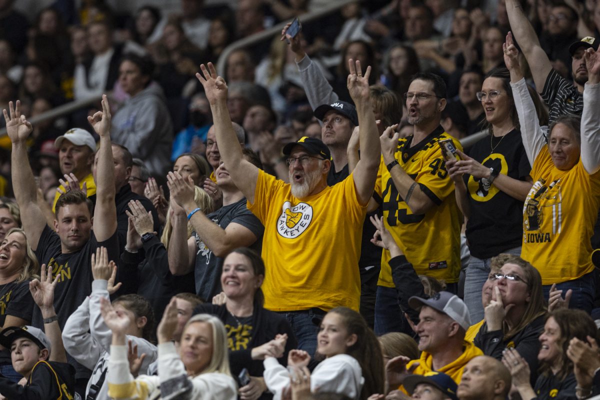 Iowa fans cheer during a NCAA Tournament Sweet Sixteen game between No. 1 Iowa and No. 5 Colorado at MVP Arena in Albany, N.Y., on Saturday, March 30, 2024. The Hawkeyes defeated the Buffaloes, 89-68.
