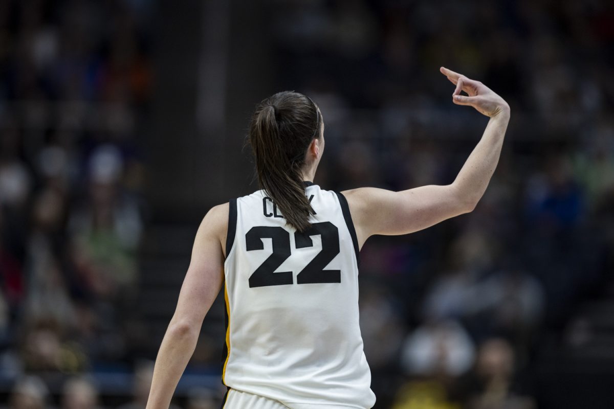 Iowa+guard+Caitlin+Clark+signals+for+a+3-pointer+during+a+NCAA+Tournament+Sweet+Sixteen+game+between+No.+1+Iowa+and+No.+5+Colorado+at+MVP+Arena+in+Albany%2C+N.Y.%2C+on+Saturday%2C+March+30%2C+2024.+The+Hawkeyes+defeated+the+Buffaloes%2C+89-68.