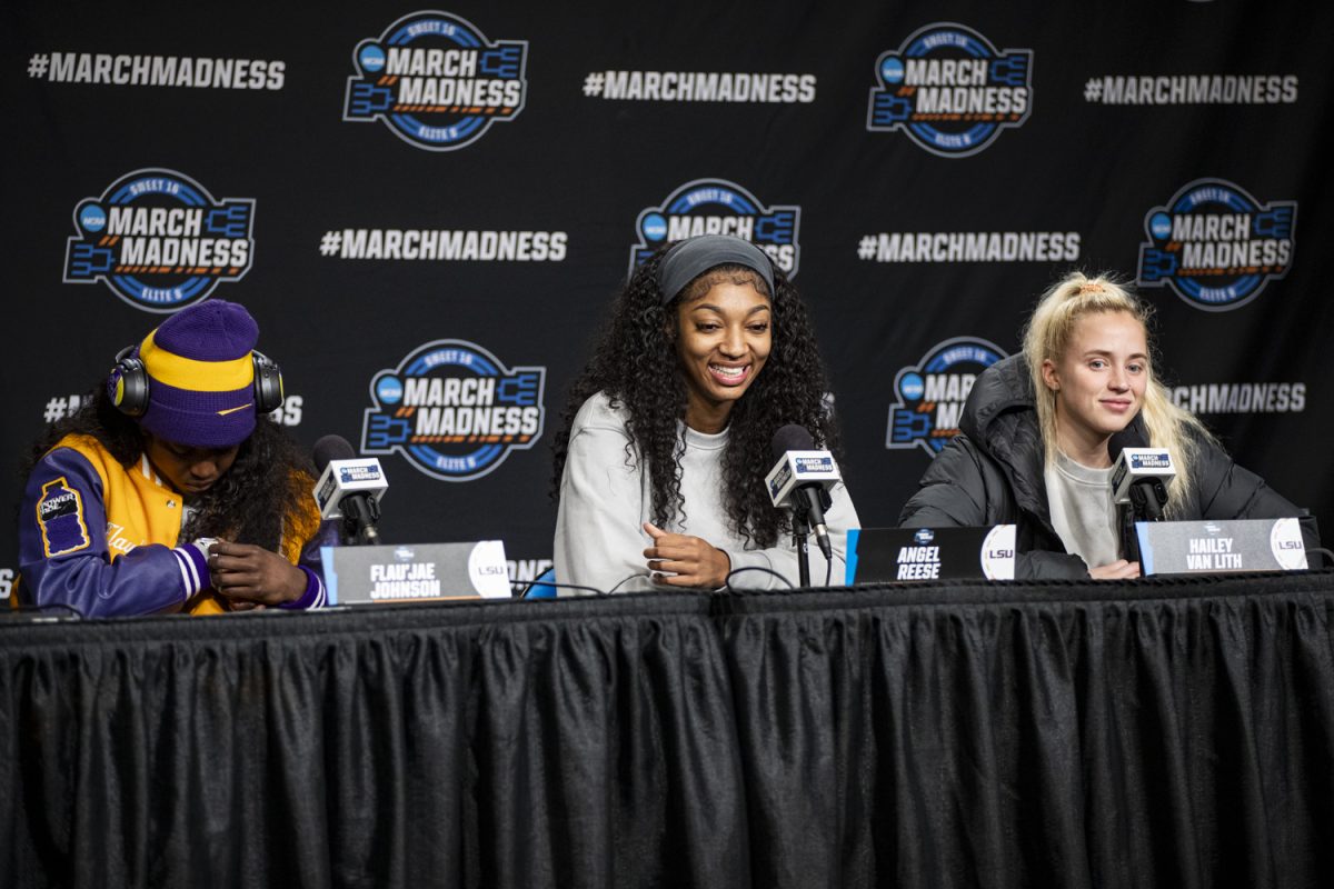 LSU guard Flaujae Johnson, forward Angel Reese, and guard Hailey Van Lith answer questions from reporters during a day of press conferences and open locker rooms ahead of a NCAA Tournament Elite Eight game between No. 1 Iowa and No. 3 LSU at MVP Arena in Albany, N.Y., on Sunday, March 31, 2024.