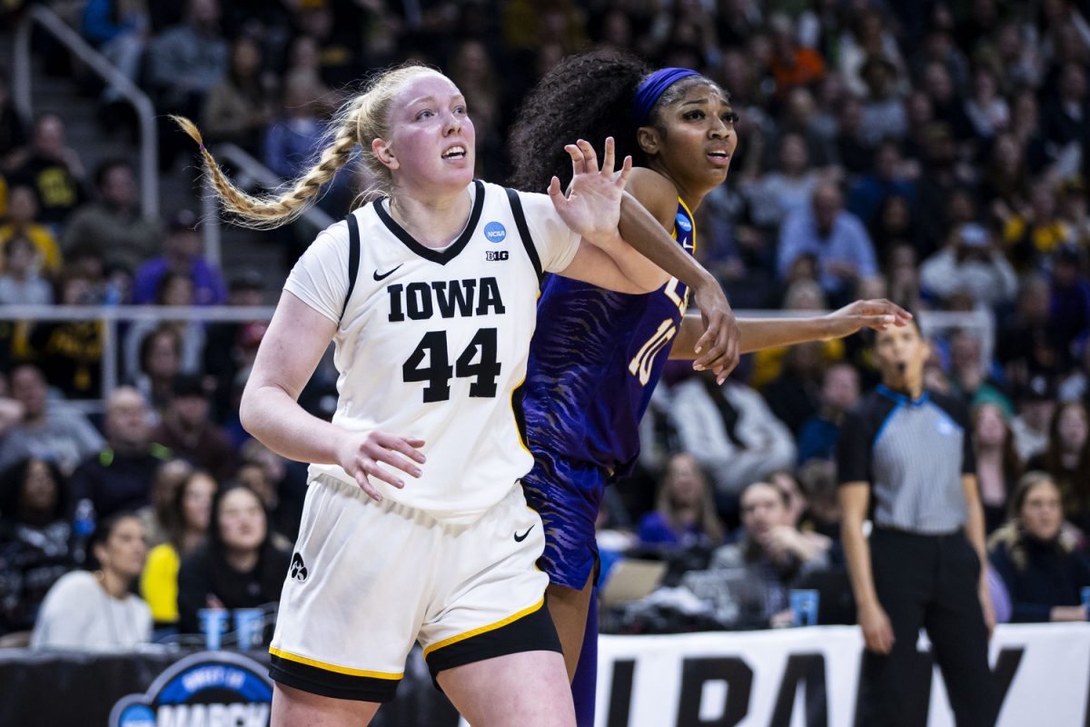 Iowa+center+Addison+OGrady+and+LSU+forward+Angel+Reese+fight+for+a+spot+in+the+lane+during+an+NCAA+Tournament+Elite+Eight+game+between+No.+1+Iowa+and+No.+3+LSU+at+the+Hilton+Hotel+in+Albany%2C+N.Y.%2C+on+Monday%2C+April+1%2C+2024.+The+Hawkeyes+defeated+the+Tigers%2C+94-87.+