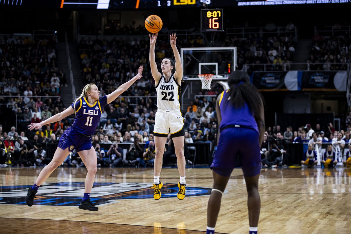 Iowa guard Caitlin Clark shoots a 3-pointer during an NCAA Tournament Elite Eight game between No. 1 Iowa and No. 3 LSU at the Hilton Hotel in Albany, N.Y., on Monday, April 1, 2024. The Hawkeyes defeated the Tigers, 94-87.