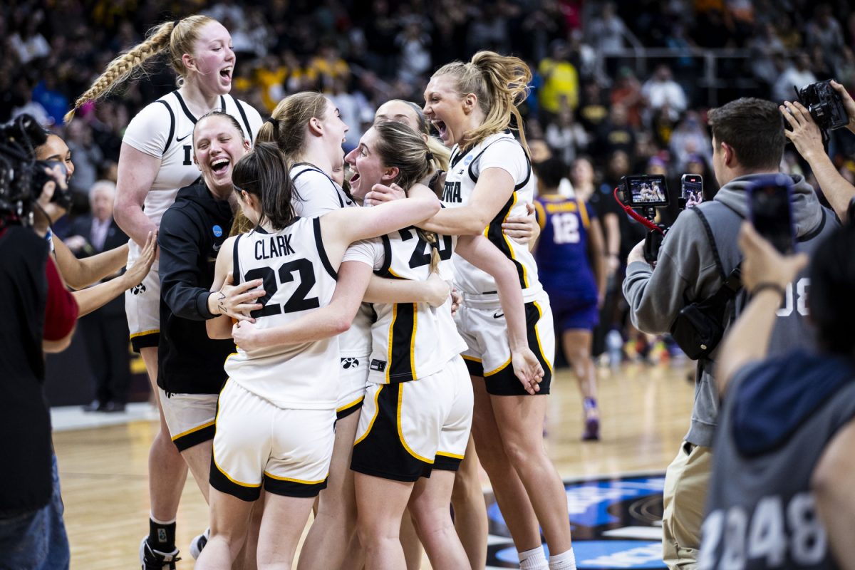 Iowa celebrates winning an NCAA Tournament Elite Eight game between No. 1 Iowa and No. 3 LSU at the Hilton Hotel in Albany, N.Y., on Monday, April 1, 2024. The Hawkeyes defeated the Tigers, 94-87.