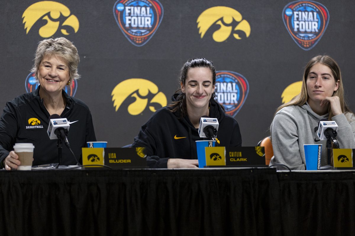 Iowa head coach Lisa Bluder and guards Caitlin Clark and Kate Martin answer questions from reporters during a day of press conferences, open locker rooms, and open practices ahead of an NCAA Tournament Final Four game between No. 1 Iowa and No. 3 UConn at Rocket Mortgage FieldHouse in Cleveland, Ohio, on Thursday, April 4, 2024. The Hawkeyes and the Huskies face off Friday at 8:30 p.m. CT.